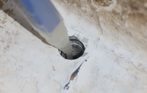 filling small boat hole with fiberglass filler or putty 
