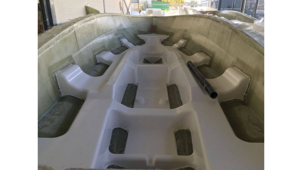 a view of a stringer inside a fiberglass boat hull